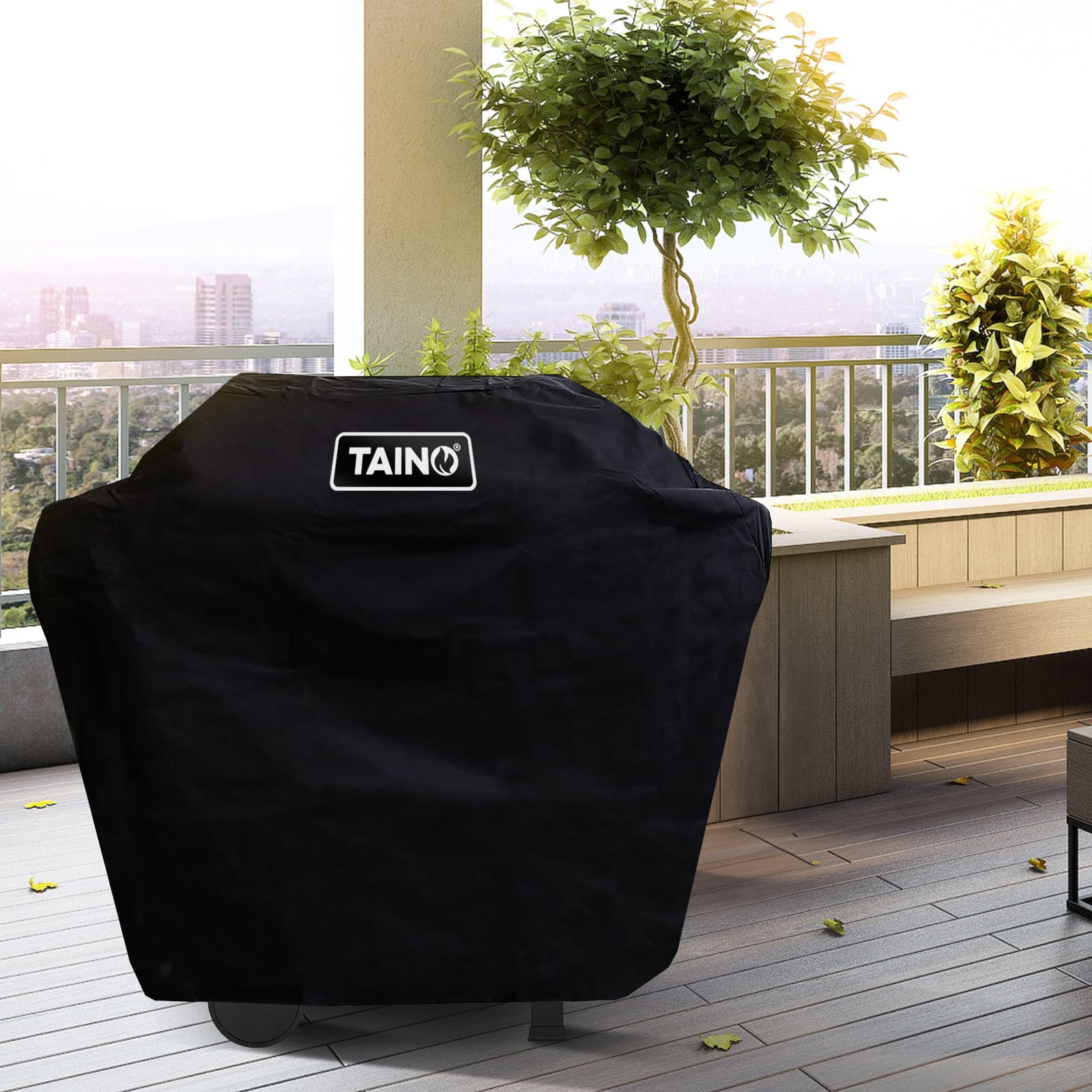 TAINO WABAYA Wetterfeste Grill Abdeckhaube - Beispielbild auf Terrasse